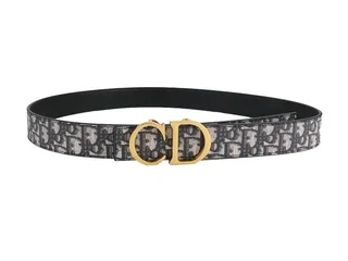 A patterned leather belt with a gold double-ring buckle