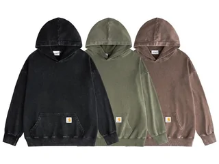 Three hooded sweatshirts laid flat, in black, olive and brown