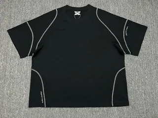 A black short-sleeved tee with contrast stitching, laid flat